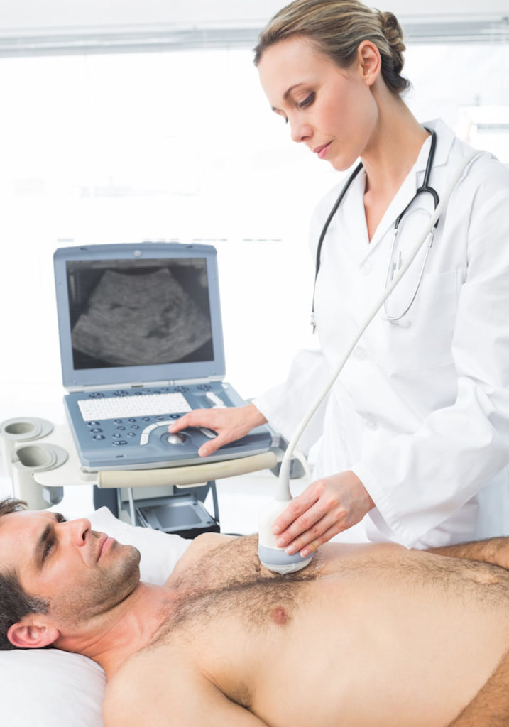 Cardiologist gives heart ultrasound to patients
